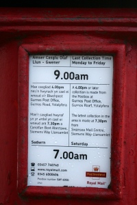 close up of notice - last collection on saturday - 7 am, weekdays - 9 am!
