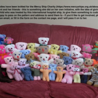 group of teddies knitted for the Mercy Ship Charity by Judy Grant - see text on photo if you would like to join her! (UK)